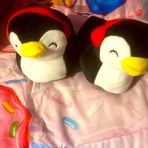 Kids penguin with earmuffs slippers size 5/6. Never used, no tag, great shape.